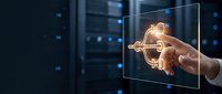 Male hand touching glowing digital key on transparent screen with server room background, representing cybersecurity, data protection, and secure access technology solutions.