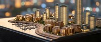Miniature architectural scale model of a modern waterfront city with illuminated skyscrapers and marina, displayed on a table with bokeh city lights background.