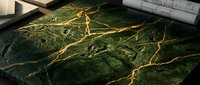 Aerial view of forested landscape with winding golden rivers cutting through dense green vegetation, suitable for environmental and geography projects.