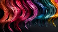 Vibrant wavy strands of multicolored hair flowing horizontally against dark background, featuring bright rainbow spectrum from red through pink, purple, blue, and orange.