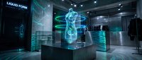 Futuristic holographic human anatomy display in modern medical laboratory with glowing cyan projections and advanced technology equipment for healthcare research.