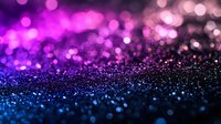 Magical purple and blue bokeh lights creating dreamy sparkle effect on dark background, defocused glowing particles for festive or celebration designs.
