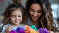 Latina mother and young daughter with curly hair share joyful moment playing with colorful toys, expressing genuine happiness and connection in casual home setting.