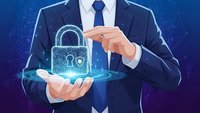 Professional businessman in dark suit protecting glowing digital padlock with hands representing cybersecurity data protection and secure business solutions.