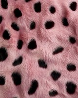 Pink leopard print fur texture with black spots on soft fluffy material for fashion design backgrounds and trendy animal pattern projects.