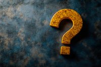 Golden question mark symbol on dark textured background with dramatic lighting and moody atmosphere, representing mystery, doubt, and uncertainty.