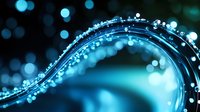 Glowing blue wave pattern with bokeh light effects and sparkles on dark background creates magical atmosphere for abstract design backgrounds.