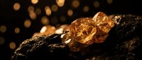 Raw amber gemstones on dark volcanic rock with golden bokeh lights creating luxury jewelry and mineral collection atmosphere for premium design projects.