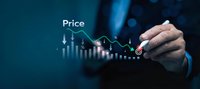 Businessman analyzing price trends on digital interface with financial charts and graphs showing market data visualization for investment decisions.