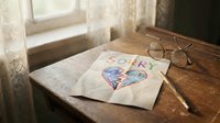 Handwritten sorry note with broken heart drawing on crumpled paper, placed on rustic wooden desk near vintage glasses and window.