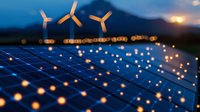 Solar panels and wind turbines at sunset with glowing light orbs floating above, representing renewable energy innovation and sustainable power generation technology.