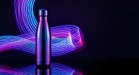 Stainless steel water bottle with vibrant neon light trails in purple and pink creating dynamic flowing patterns on dark background for modern lifestyle branding.
