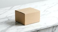 Brown cardboard shipping box on white marble surface for e-commerce packaging and delivery services in modern minimalist style.