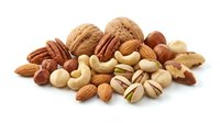 Mixed nuts collection with almonds, walnuts, cashews, pecans and hazelnuts isolated on white background for healthy snacking and cooking recipes.