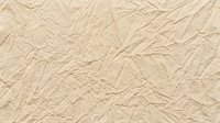 Crumpled beige paper texture with wrinkled surface, suitable for backgrounds, packaging design, and creative projects.