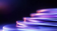 Glowing purple and blue neon light trails create dynamic spiral patterns against dark background, abstract motion effect for modern technology designs.