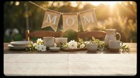 Rustic outdoor table decorated with ceramic dishes, white flowers, and a burlap MOM banner in warm sunlight for Mother's Day celebration.