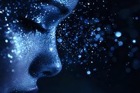 Ethereal close-up of a glowing nose profile against dark background with magical sparkles and bokeh lights creating dreamy atmospheric effect in blue tones.