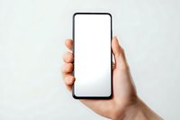 Hand holding modern smartphone with blank white screen against light background. Perfect for app or website mockup.