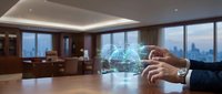 Businessman hands on conference table in modern office boardroom with city skyline view through windows for corporate meetings and business presentations.