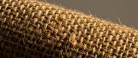 Natural burlap fabric texture with woven jute fibers showing detailed textile pattern for rustic crafts and eco-friendly packaging design projects.