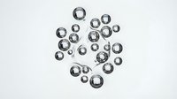 Isolated water droplets and bubbles arranged in circular formation on white background, suitable for design projects, overlays, and digital compositions.