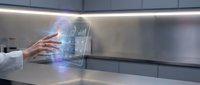 Futuristic holographic interface with glowing data visualization in modern kitchen setting for technology and smart home applications.