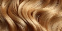 Luxurious golden blonde hair waves flowing with silky smooth texture and natural shine for beauty and haircare concepts.