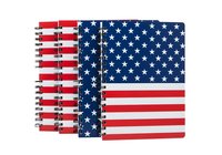 Spiral bound notebook with patriotic flag design featuring stars and stripes, isolated on white background, suitable for stationery, office supplies, back to school designs and merchandise.