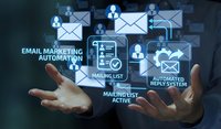Business professional hands presenting email marketing automation concept with digital icons, mailing lists, and automated reply systems for campaigns.