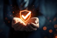 Businessman hands holding glowing shield with checkmark, symbolizing digital security, data protection, and risk management in corporate environment.
