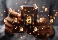 African American hands holding smartphone with glowing network of padlock icons, representing digital security and data protection in mobile technology.