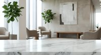 Modern minimalist living room with marble table surface in foreground, blurred contemporary furniture and green plants creating elegant interior design space.