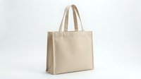 Blank natural cotton tote bag with dual handles isolated on white background, ready for branding, printing, or merchandise design projects.
