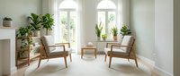 Modern minimalist living room interior with wooden armchairs, houseplants and natural light from arched windows creating serene home decor atmosphere.