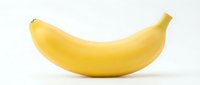 Ripe yellow banana isolated on white background, ready for design use on packaging, menus, nutrition guides, and culinary projects.