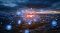 Glowing start button with connected network nodes and business icons floating over dramatic stormy landscape, digital transformation concept for business solutions.