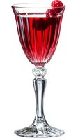 Red cocktail with fresh raspberries in elegant crystal glass on white background, isolated drink photo for menu, bar and restaurant promotion.