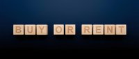 Buy or rent decision concept with wooden blocks displaying text on dark background for real estate and property choices.