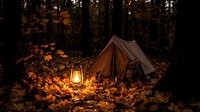 Cozy autumn camping scene with glowing lantern and tent surrounded by golden fall leaves in dark forest for outdoor adventure and wilderness exploration.