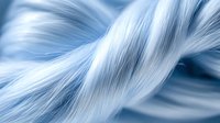 Soft flowing strands of light blue and white intertwined in an abstract wave pattern creating a gentle ethereal background texture for creative designs.