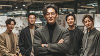 Confident Asian businessman leading diverse team in modern office environment with arms crossed showing leadership and teamwork success.
