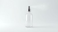 Clear glass spray bottle with metallic silver pump dispenser on white background, suitable for cosmetics, cleaning products, perfume, or skincare packaging mockups.