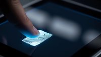 Finger touching glowing fingerprint scanner on smartphone screen for biometric security authentication and digital identity verification technology.