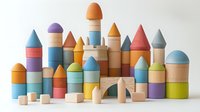 Colorful wooden building blocks arranged as fantasy castle with towers and arches on white background, featuring pastel blue, pink, orange, and yellow geometric shapes.