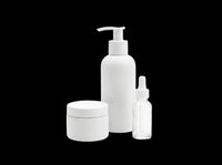 Skincare cosmetic set with pump bottle, cream jar, and dropper bottle isolated on transparent background, ready for t-shirt, sticker, and print on demand use.