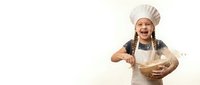 Happy young girl chef with braided hair wearing white hat and apron mixing ingredients in wooden bowl on isolated white background for cooking designs.