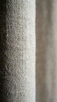 Natural linen fabric texture close-up with soft focus background for interior design and textile projects.