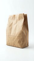 Crumpled kraft paper bag with folded top on white background, suitable for food packaging, grocery delivery, and retail product mockups.