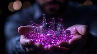 Glowing purple miniature city skyline with sparkles floating above open palms against dark background, magical futuristic concept of urban development.